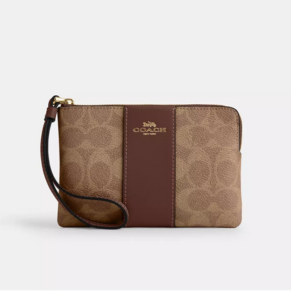 Coach wristlet muñequera gold/tan/brown monograma C - PRE ORDEN
