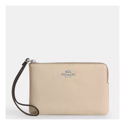 Coach wristlet muñequera cream - PRE ORDEN