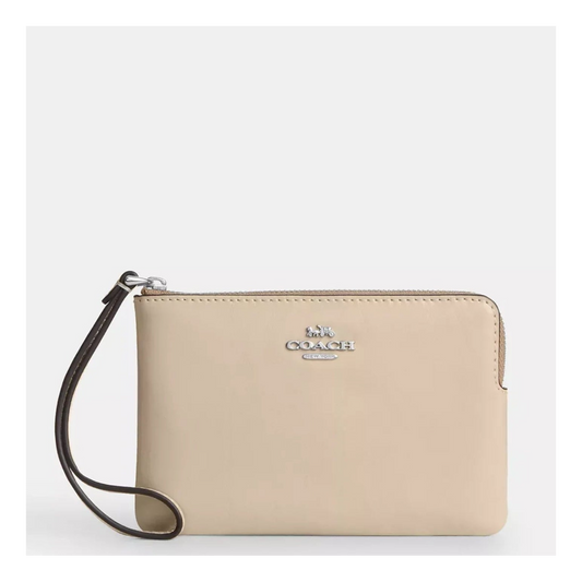 Coach wristlet muñequera cream - PRE ORDEN